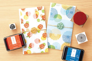 Shachihata large stamp ink pad set with multiple colors and stamped paper samples