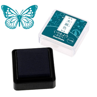 Shachihata mini stamp ink pad with blue-green ink cube and butterfly icon