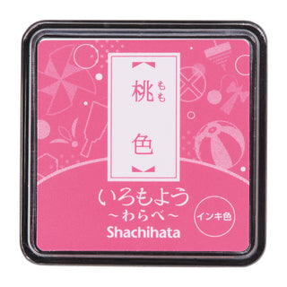 Pink mini stamp ink pad in square black base with clear case