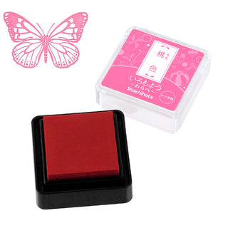 Red mini stamp ink pad in square black base with clear case