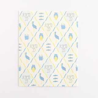 Patterned letter set stationery sheet with blue and yellow animal icons