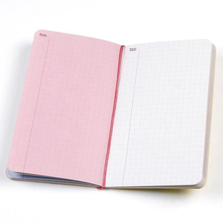A6 slim diary open with pink left grid page, white right page, and red spine elastic