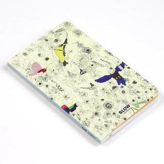 A6 slim open-dated diary front cover shown at an angle with pale yellow bird pattern
