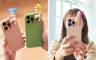 Sonny Angel Hippers mini figurines perched on phone backs in hand