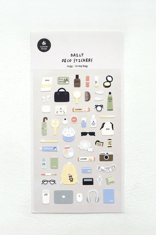 Daily stickers sticker sheet with small icons, bags, cameras, and labels