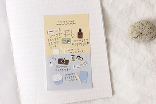 In my bag sticker sheet with luggage, camera, coffee, and note-style icons