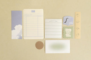 Stationery sticker set featuring a cloud card, lined notes, and small stamp-like icons.