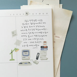 Retro office sticker sheet with typewriter, calculator, and lined notes icons on paper