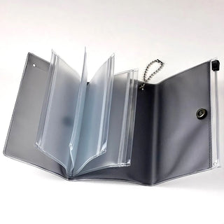Black holographic 5-pocket travel pouch with zipper, chain handle, open view