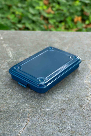 Navy trunk-shape metal toolbox with molded lid and corner screws