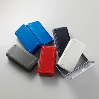 Stackable storage boxes with hinged lids in multiple colors, including blue and gray.