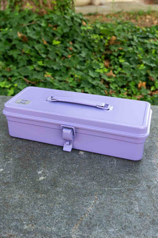 Lilac trunk-shaped toolbox with metal latch and carrying handle