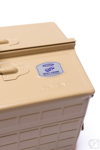 Beige cantilever toolbox lid with TOYO STEEL label and PATENT marking