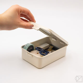 Stackable storage box with open lid showing divided interior and small items inside