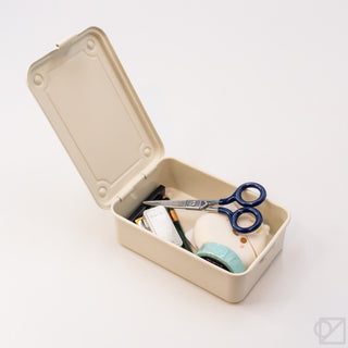 Stackable storage box with lid open showing stationery, scissors, and assorted items