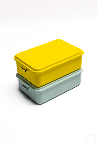 Stackable storage box with yellow lid stacked on blue base