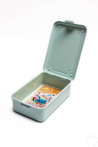 Glacier blue stackable storage box open with lid, showing colorful card inside