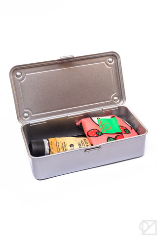 Silver-gray stackable storage box with hinged lid open, holding small supplies.