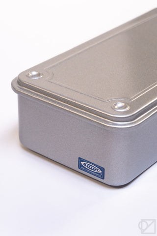 Silver-gray stackable storage box side view with TOYO label and rounded corners.