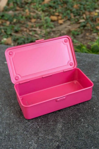 Shocking pink stackable storage box open, showing interior compartment