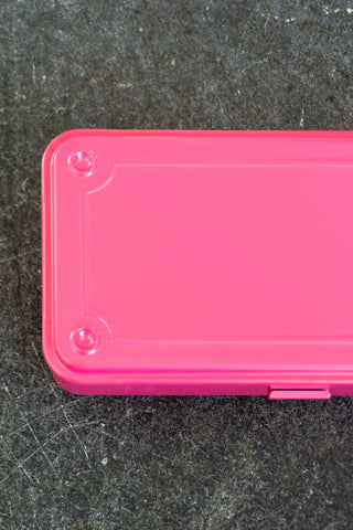Shocking pink storage box lid corner detail with latch