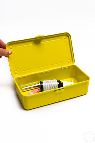Yellow stackable storage box open with hinged lid showing interior storage space
