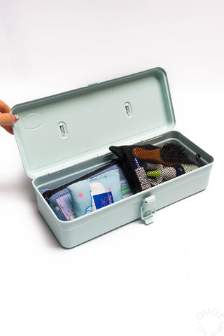 Glacier blue trunk-shaped toolbox open with compartments and divider pouch