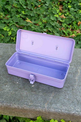 Lilac trunk toolbox with translucent lid open to interior storage tray