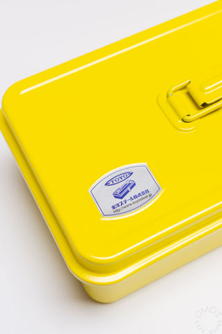 Yellow trunk-shape toolbox with TOYO STEEL label on lid