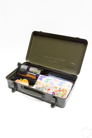 Olive green trunk toolbox open; twin latches with small items and a patterned pouch inside.