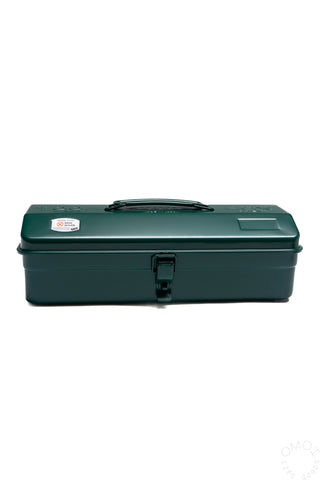 Antique green metal toolbox closed, side view with front handle latch