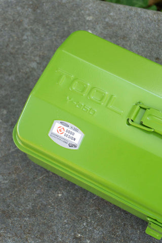 Matcha green toolbox close-up with embossed label and front latch detail