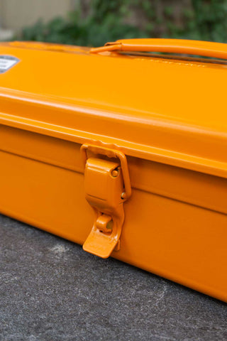 TOYO STEEL orange toolbox side latch and hinge detail on closed lid