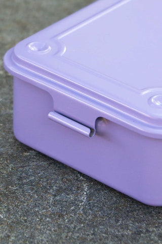 Lilac trunk-shaped toolbox side view with handle latch bar