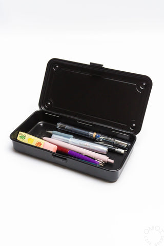 Black trunk toolbox open, showing pens and small tools inside.