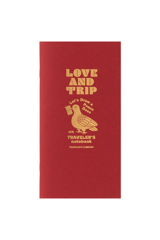 Red Traveler's notebook refill cover with gold Love and Trip lettering and bird icon
