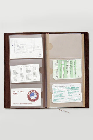 Traveler's notebook card file, open brown cover with card inserts in card slots