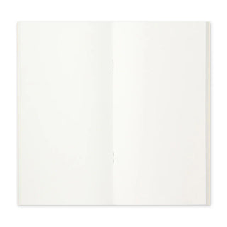 Lightweight paper notebook opened flat to blank white pages with clean inner spread.