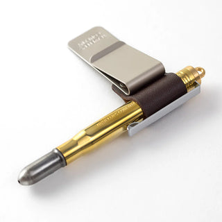 Traveler's notebook pen holder with brown leather and gold pen in slot