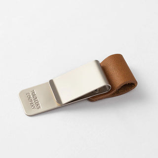 Traveler's notebook pen holder with brown leather strap and silver metal clip