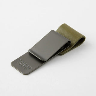 Traveler's notebook pen holder with olive-green leather strap and gray metal clip
