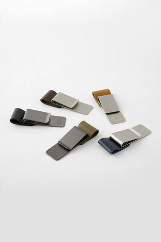 Set of Traveler's notebook pen holders in assorted colors with gray metal clips