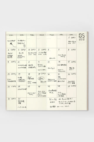 Monthly planner page with weekday columns and handwritten notes