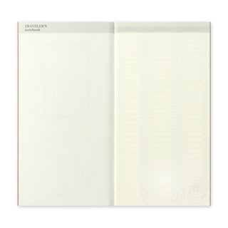 Open planner spread with blank left page and lined right page for notes
