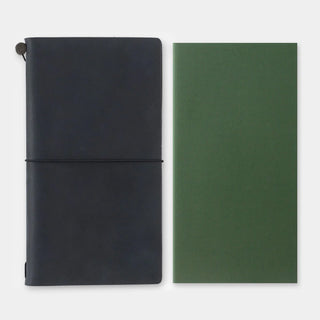 Two notebooks side by side: dark navy with elastic strap and green vertical cover