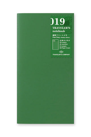 Green notebook cover with "019" label; Traveler's notebook weekly + memo planner