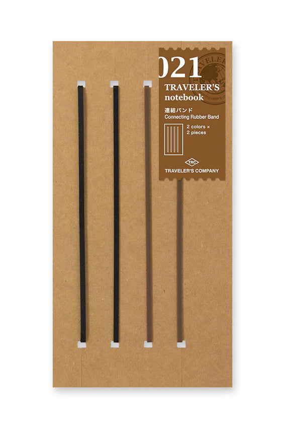 Kraft package containing four connecting rubber bands in brown and black