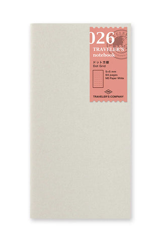 Beige dot-grid travel notebook cover with '026' label