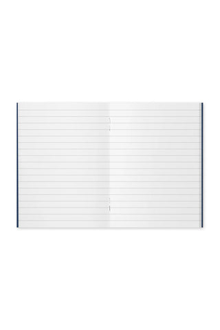 Passport-size lined notebook pages, open spread with horizontal ruled lines