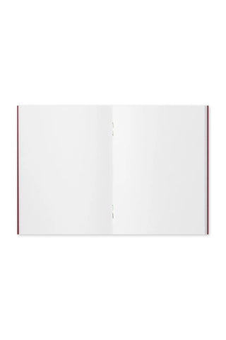 Open blank notebook with white pages and burgundy spine